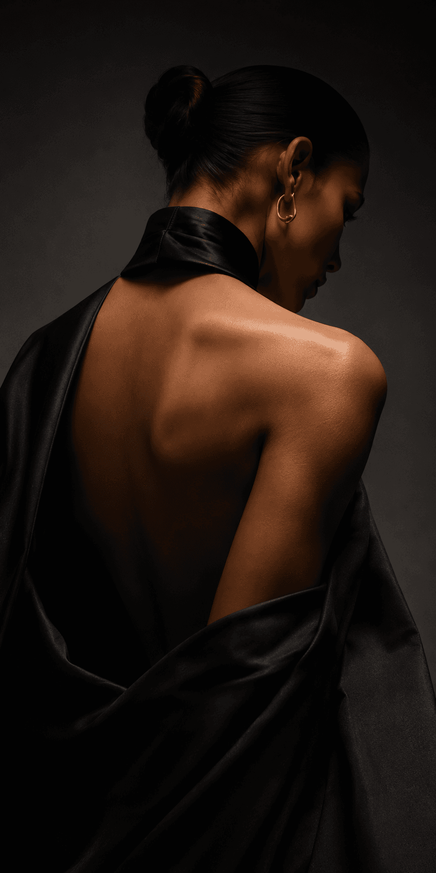 Fashion model draped in fabric